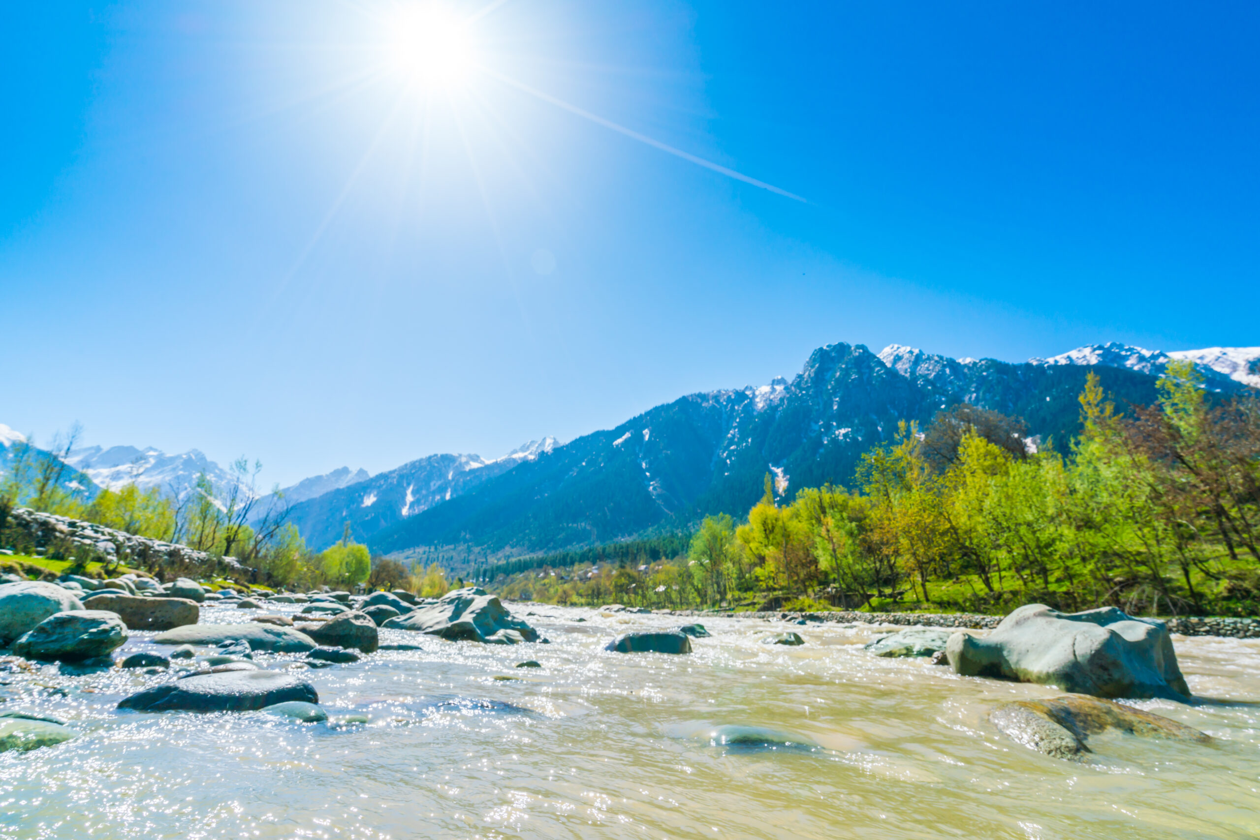 Beautiful  River and snow covered mountains landscape Kashmir state, India